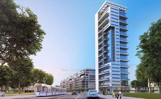 הרכבת הקלה חולפת על פני פרויקט קהילת קנדה יפו ד' של קבוצת אלמוג // הדמיה: מקס לויט