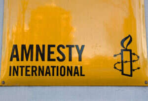 סמל ארגון אמנסטי , צילום: getty images //