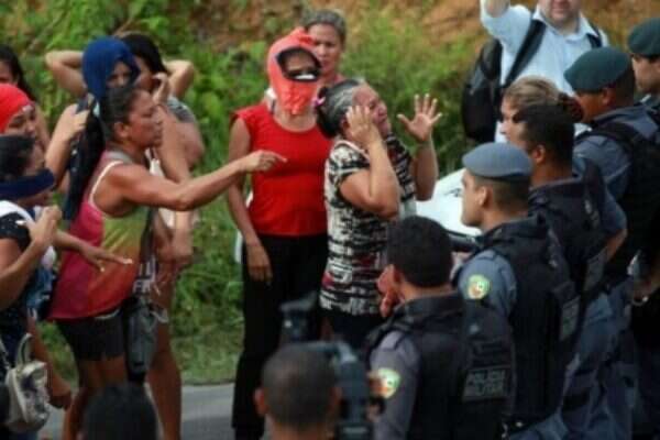 Nearly 60 killed in Brazil prison riot while dozens of inmates escape